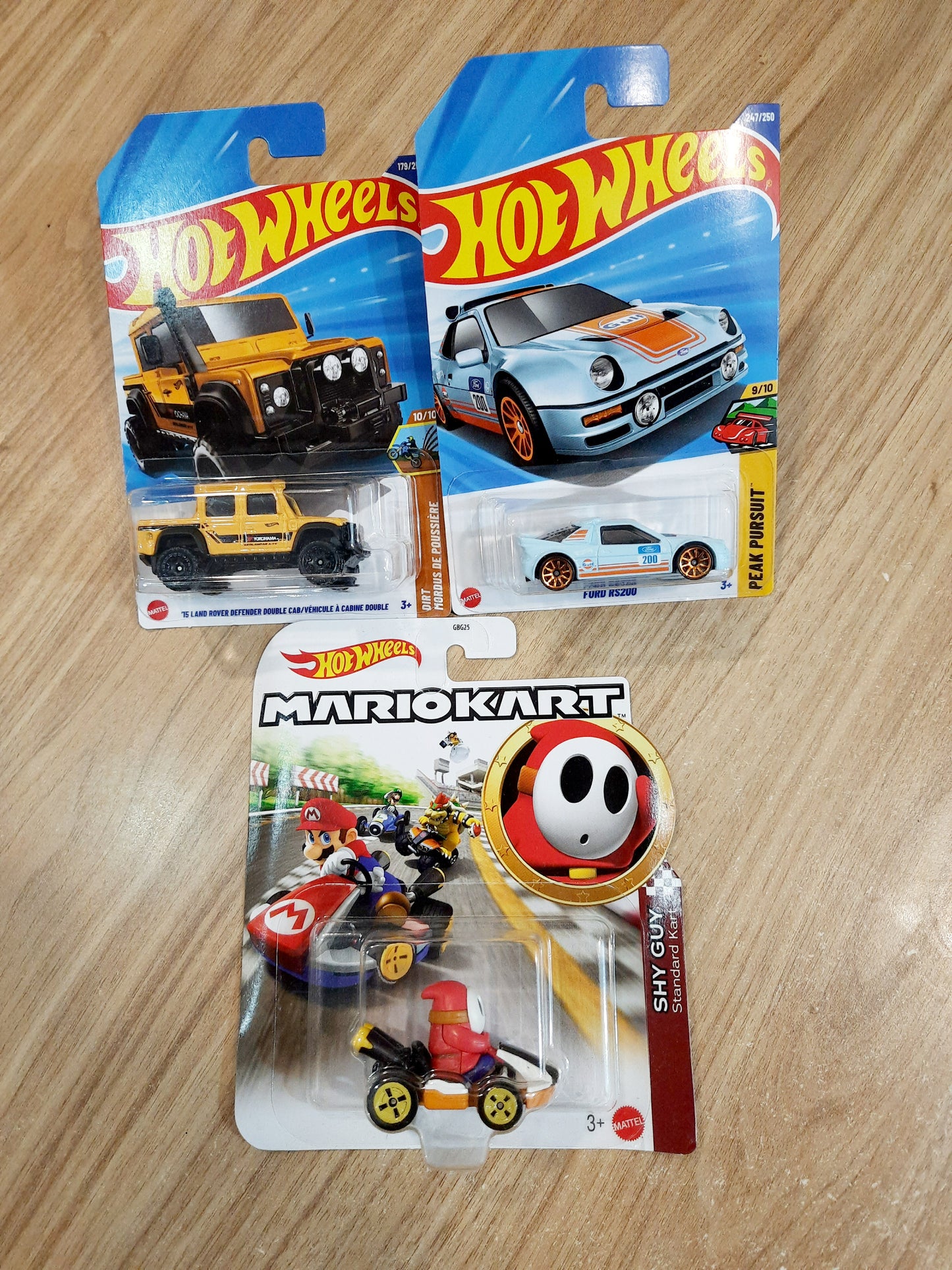 Hot Wheels Ford RS200, 15 Land Rover Defender Double Cab & Shy Guy Mariokart (combo pack of 3)