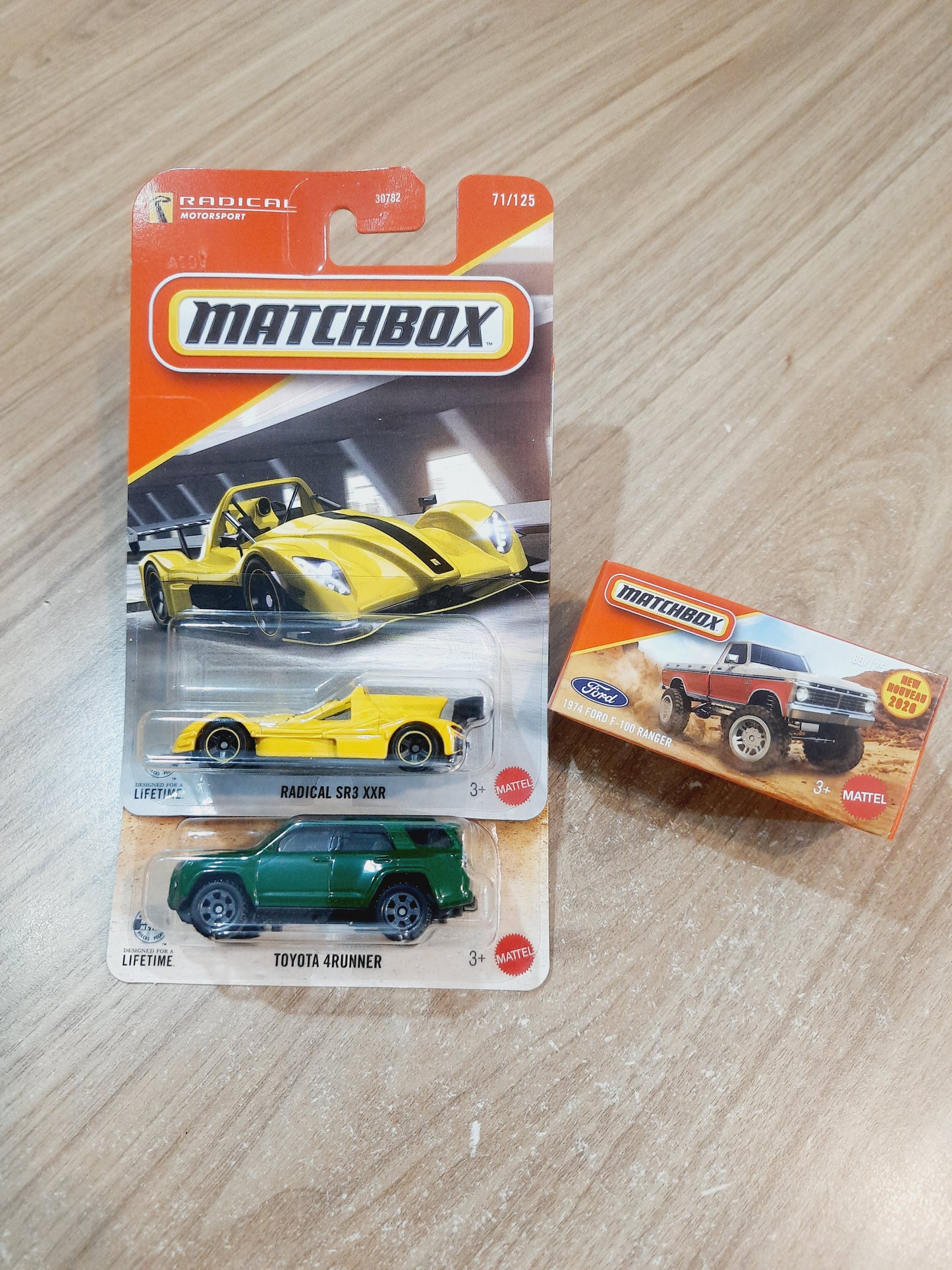 (Creased Cards) Matchbox Radical SR3 XXR, Toyota 4Runner & 1974 Ford F 100 Ranger