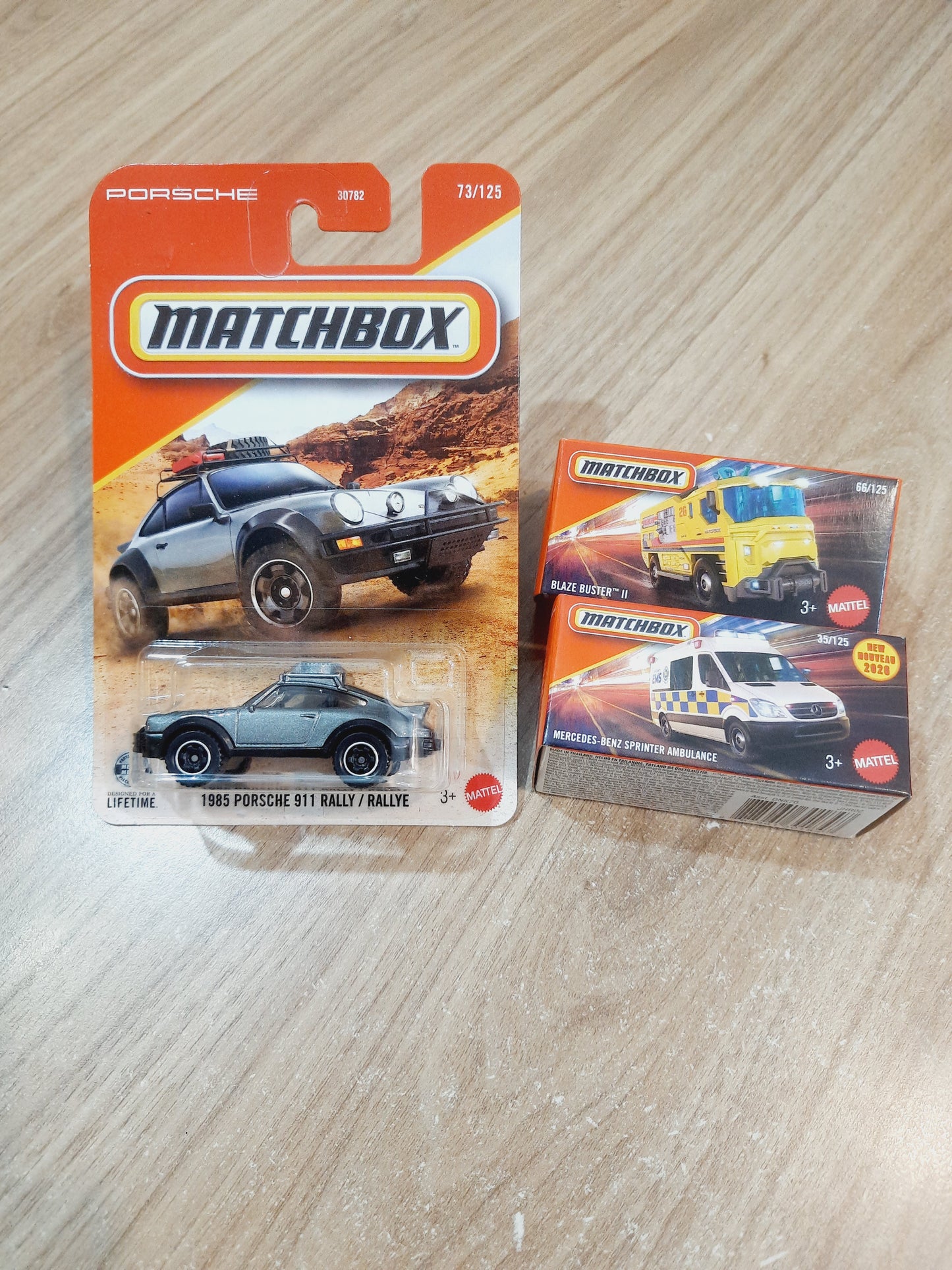 (Creased Cards) Matchbox 1985 Porsche 911 Rally, Mercedez Benz Sprinter Ambulance & Blaze Buster II