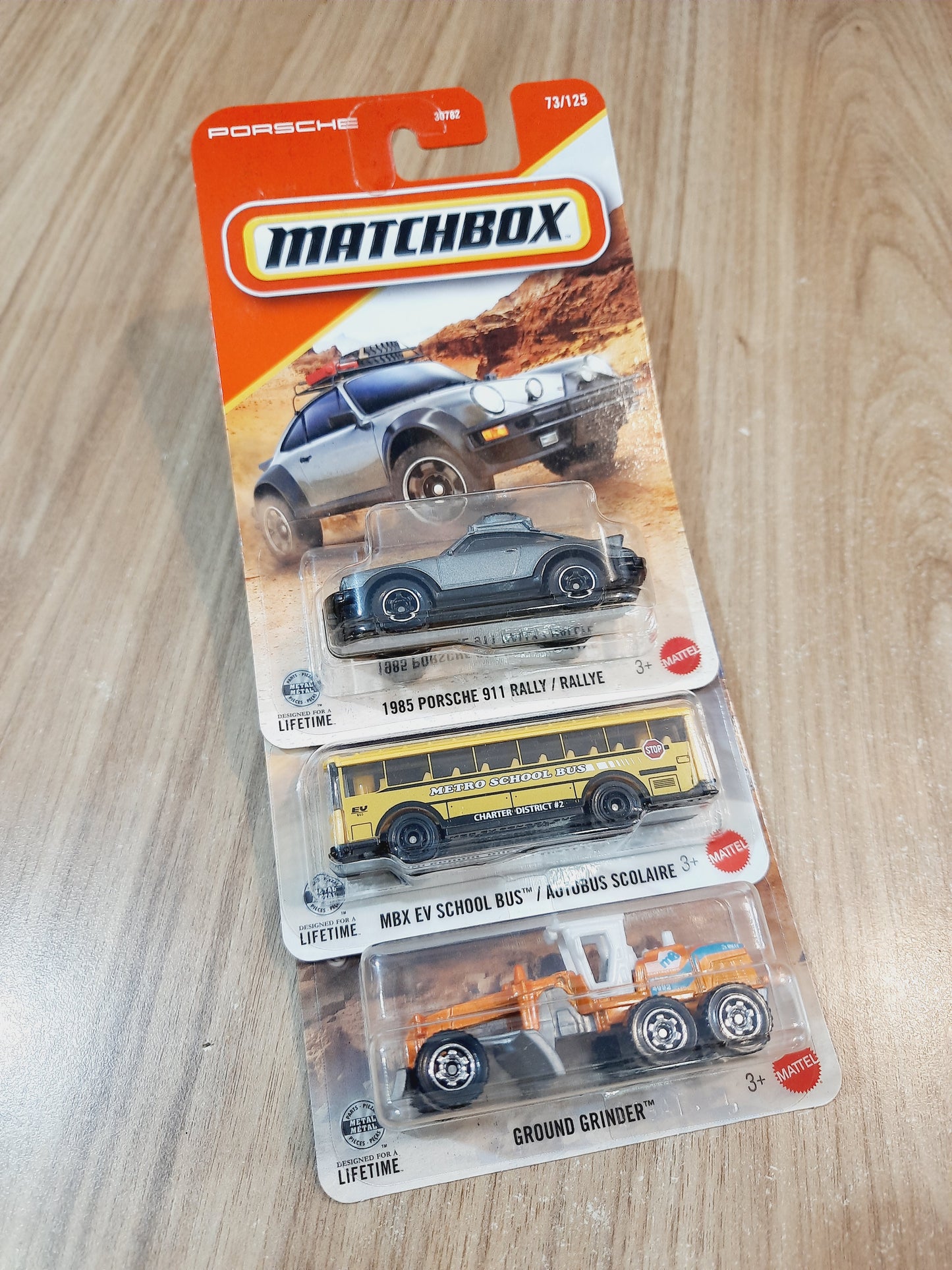 Matchbox 1985 Porsche 911 Rally, Mbx Ev School Bus & Ground Grinder Diecast Scale Model