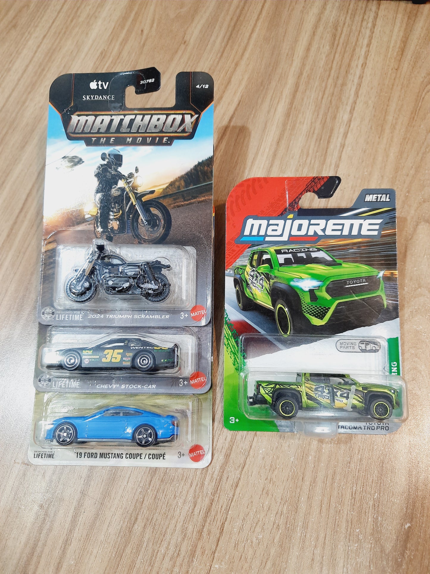 Matchbox 2024 Triumph Scrambler, Chevy Stock Car, 19 Ford Mustang Coupe & Majorette Toyota Tacoma Trd Pro
