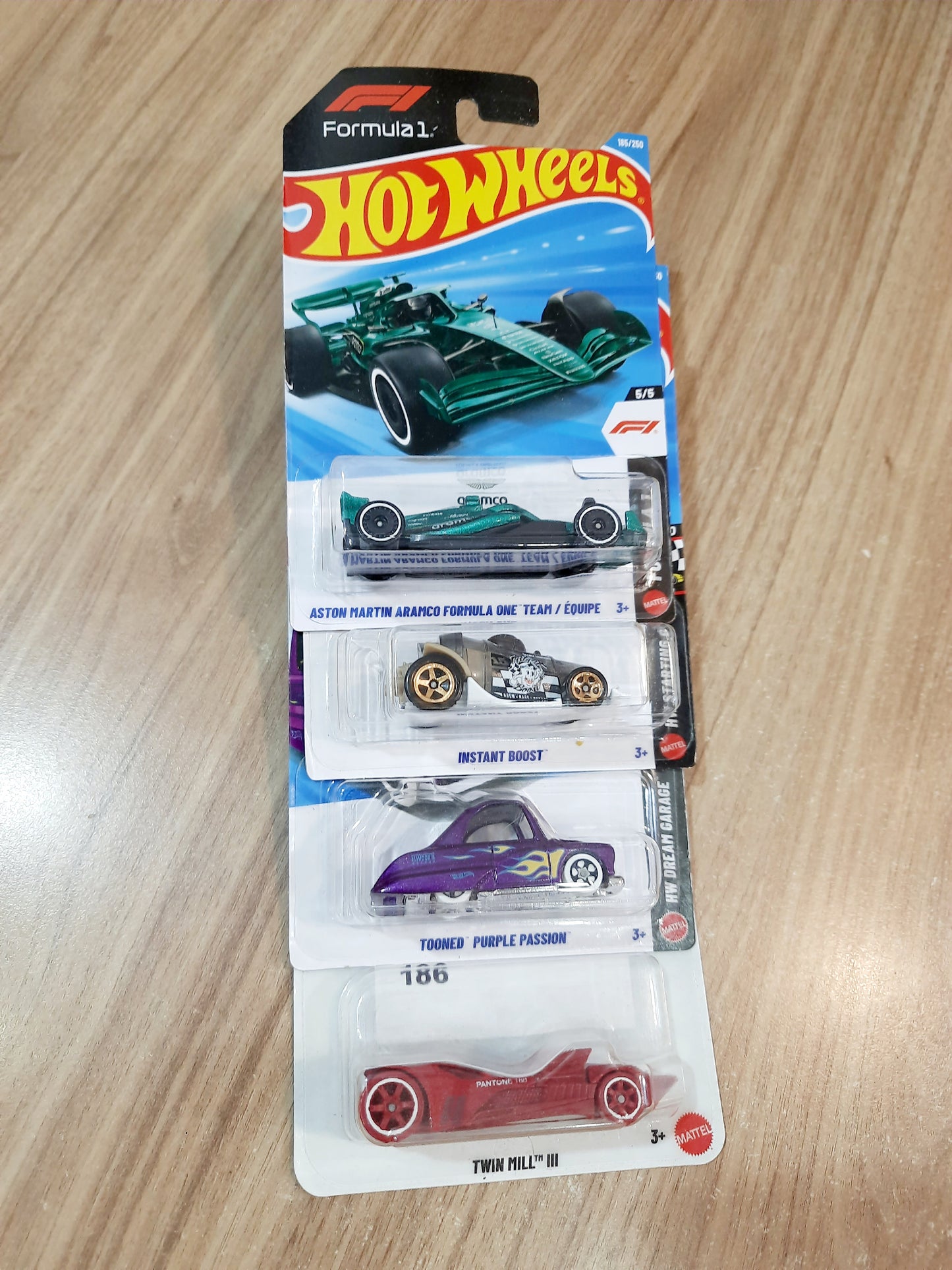 Hot Wheels Aston martin Aramco Formula One Team, Instant Boost, Tooned Purple Passion & Twin Mill lll