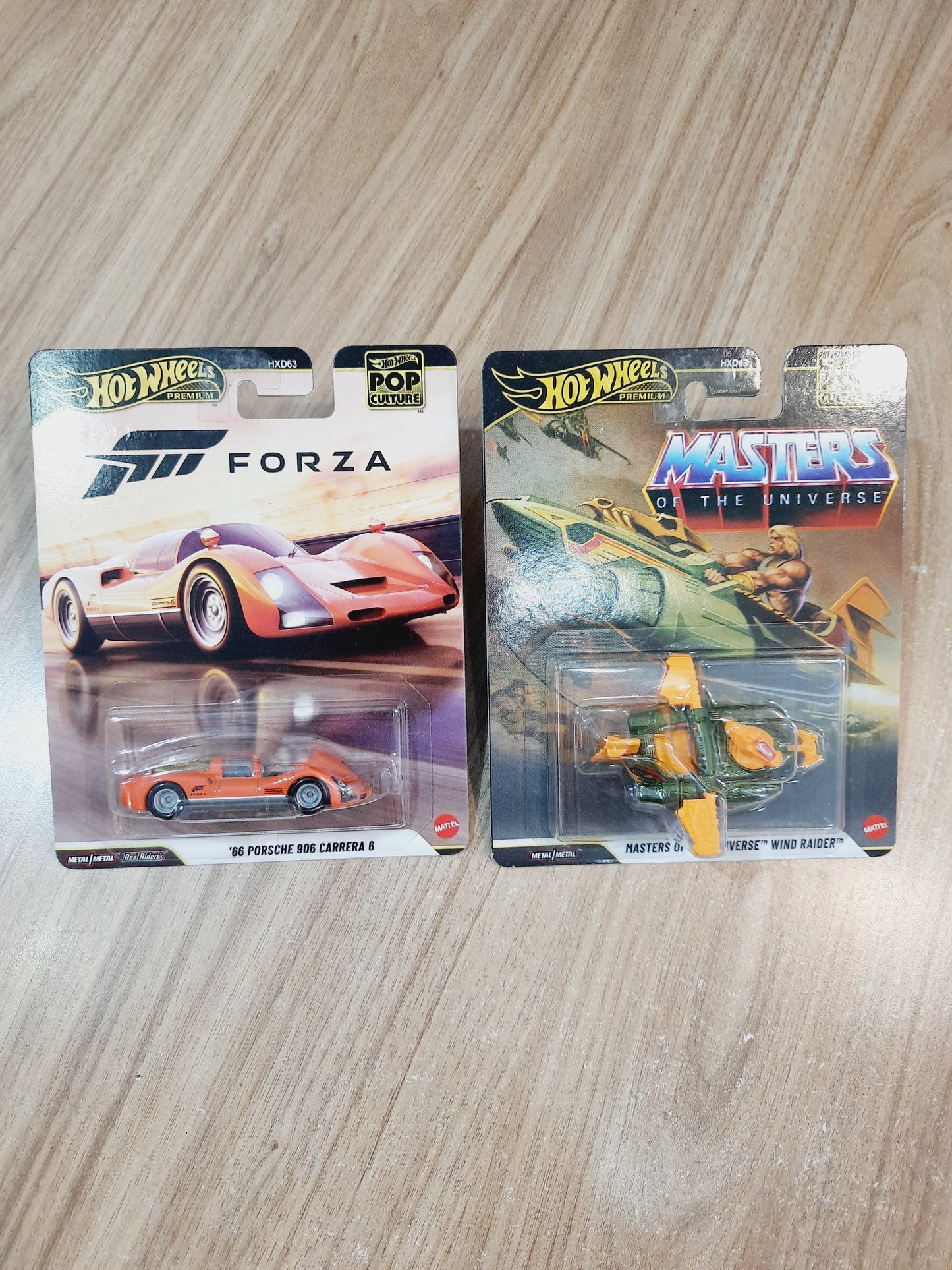 Hot Wheels Premium 66 Porsche 906 Carrera 6 & Masters of the Universe Wind Raider pack of 2 HXD63 Pop Culture