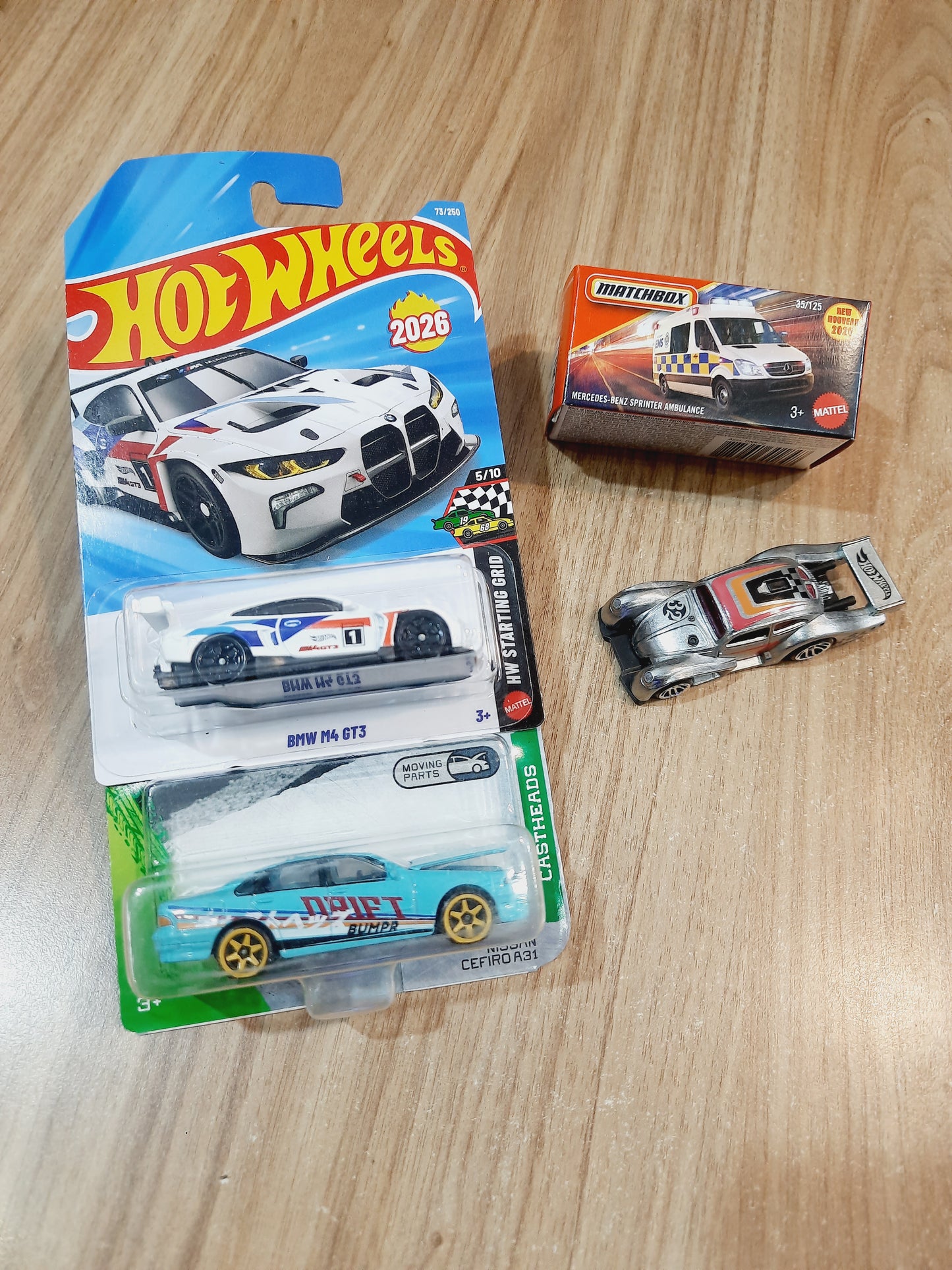 Hot Wheels BMW M4 GT3, Zamac Volkwagen Kafer Racer, Matchbox Mercedes Benz Sprinter Ambulance & Majorette Castheads Nissan Cefiro A31