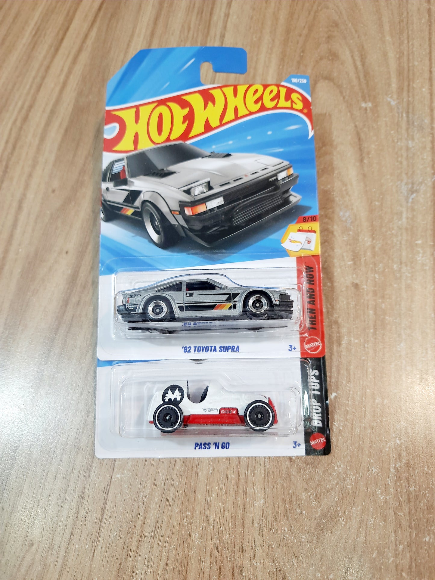 Hot Wheels 82 Toyota Supra & Pass n Go Diecast Scale Model