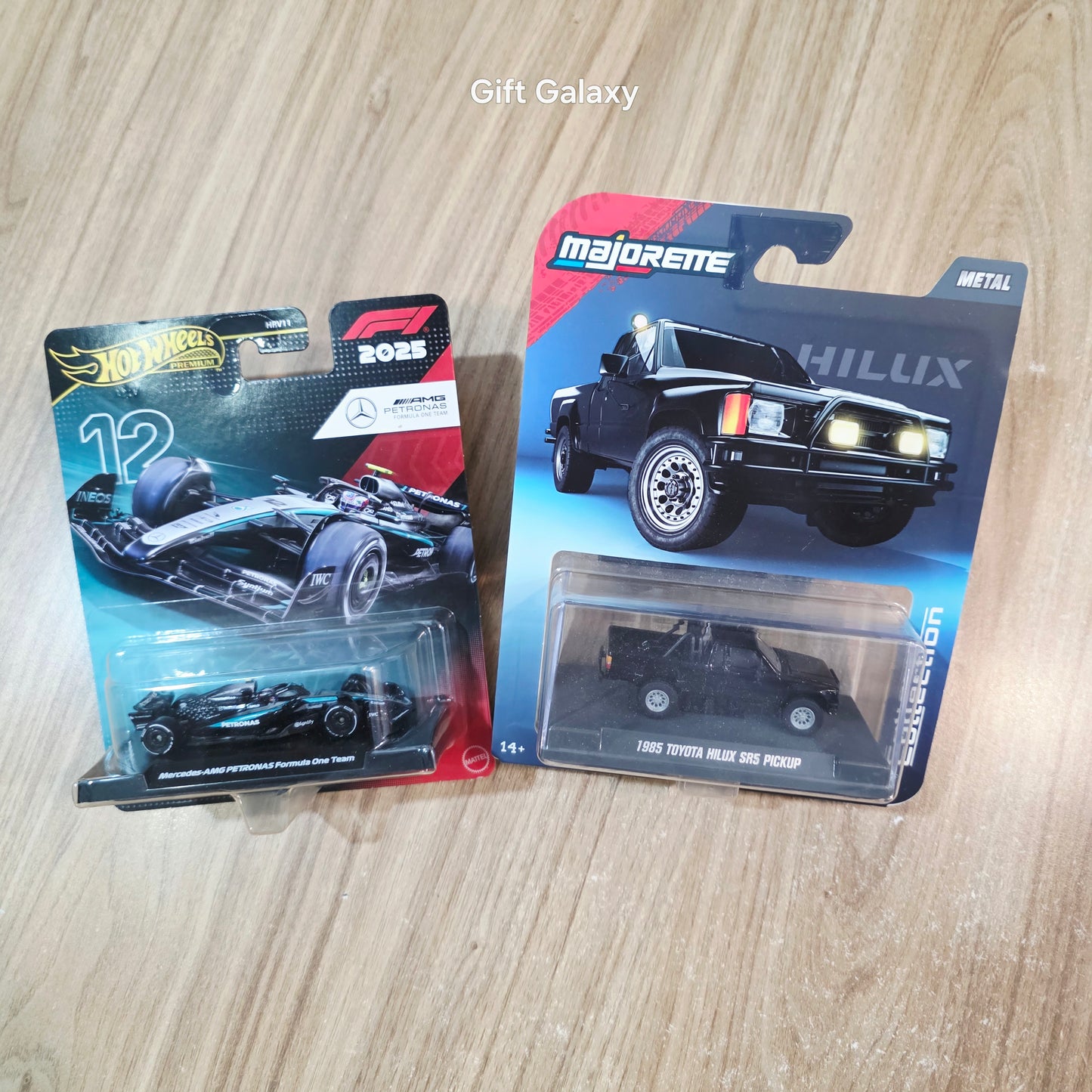 Hot Wheels Premium Formula 1 2025 Mercedes Amg Petronas Formula One Team 12 & Majorette 1985 Toyota Hilux SR5 Pickup