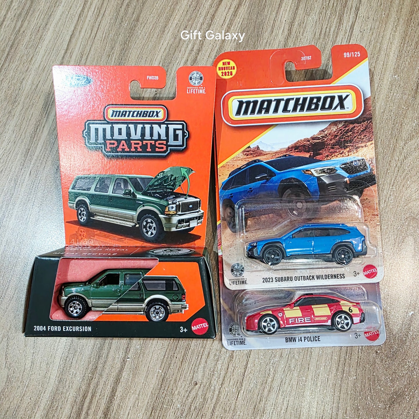 Matchbox Moving Parts 2004 Ford Excursion, 2023 Subaru Outback Wilderness & Bmw i4 Police