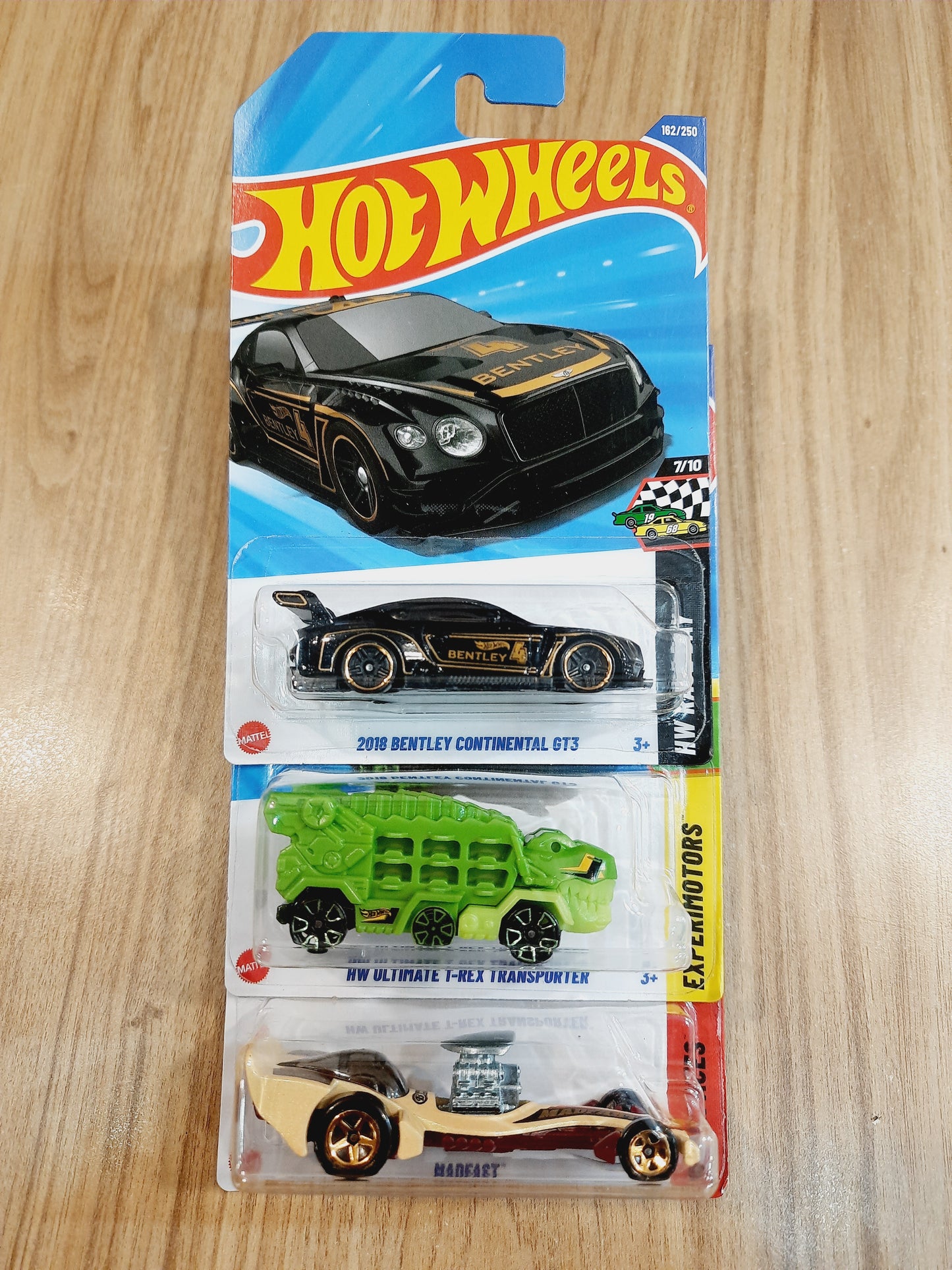 (Imported) Hot Wheels 2018 Bentley Continental GT3, HW Ultimate Trex Transporter & Madfast (combo pack of 3)