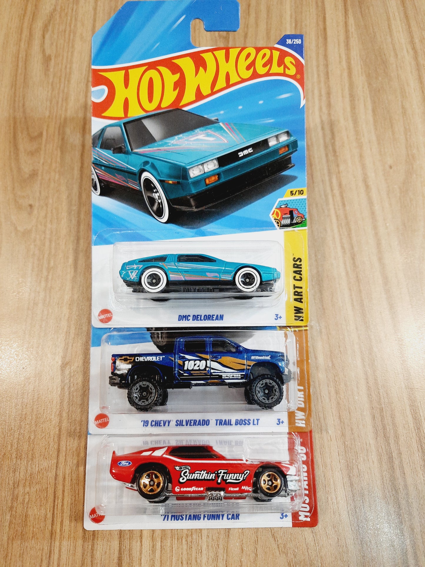 (Imported) Hot Wheels DMC Delorean, 19 Chevy Silverado Trail Boss Lt & 71 Mustang Funny Car(combo pack of 3)