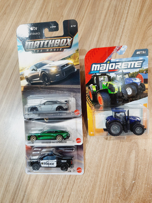 Matchbox 2020 Nissan GT R Nismo, 2025 Aston Martin Vanquish, 2024 Chevrolet Silverado PPV Truck & Majorette New Holland T7.300