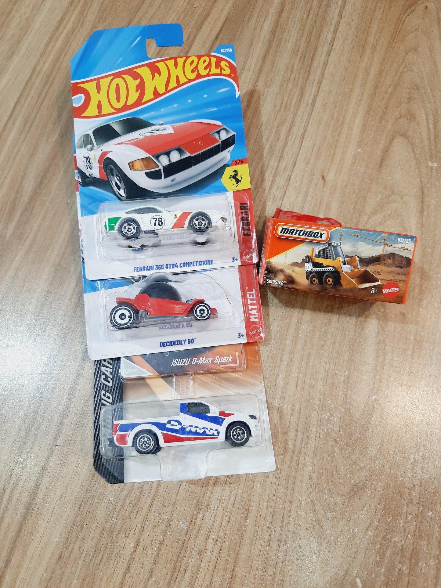 Hot Wheels Ferrari 365 GTB4 Competizione, Decidedly Go, Majorette Isuzu D Max Spark & Matchbox Skidster