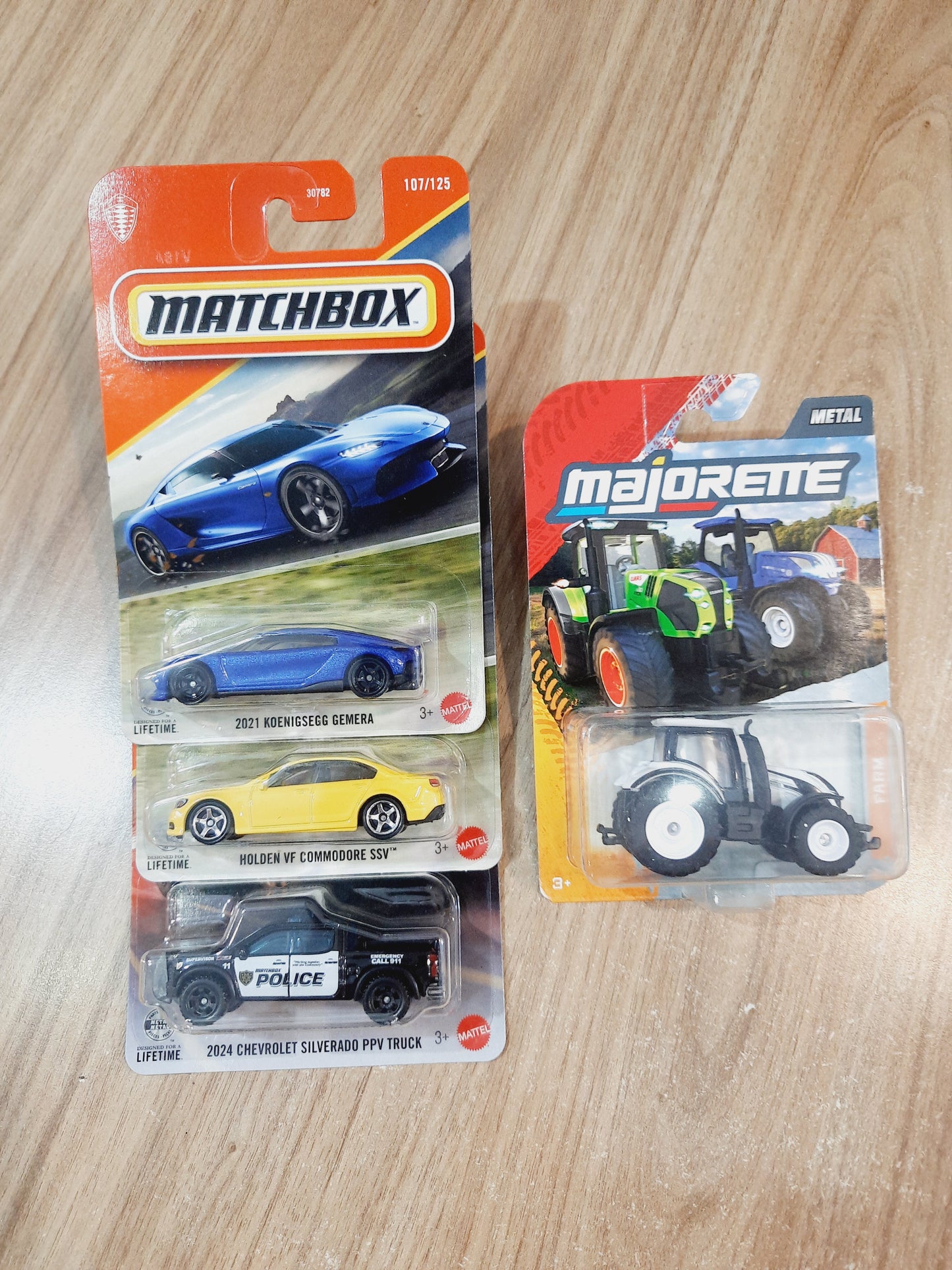 Matchbox 2021 Koenigsegg Gemera, Holden VF Commodore SSV, 2024 Chevrolet Silverado PPV Truck & Majorette Farm Valtra T4