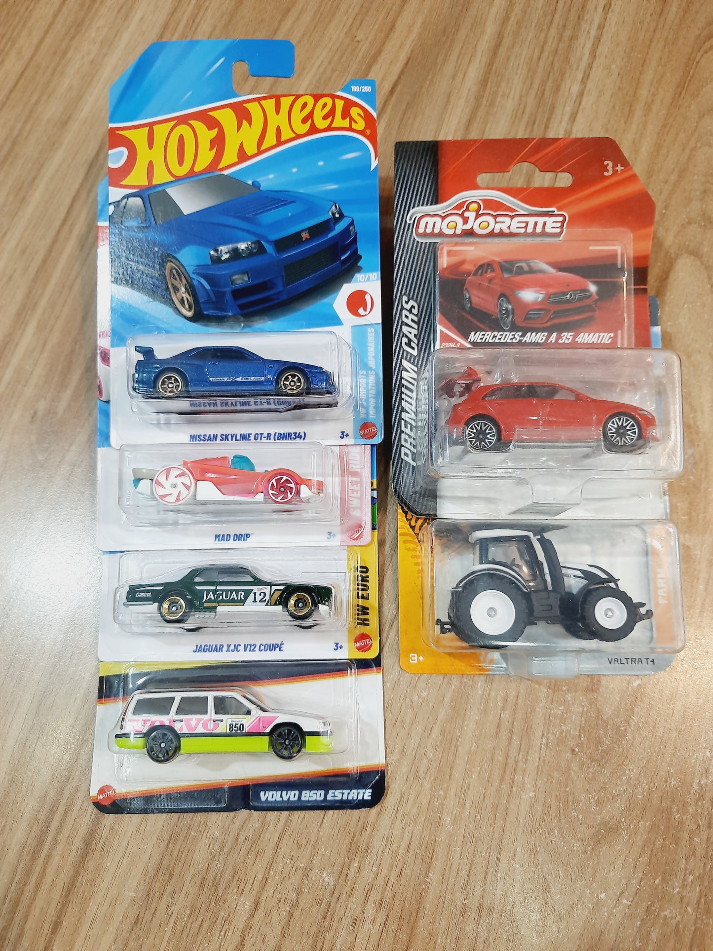 Hot Wheels Nissan Skyline GT R(BNR34), Jaguar XJC V12 Coupe, Neon Volvo 850 Estate, Mad Drip & Majorette Farm Valtra T4 | Premium Mercedes Amg A 35 4Matic