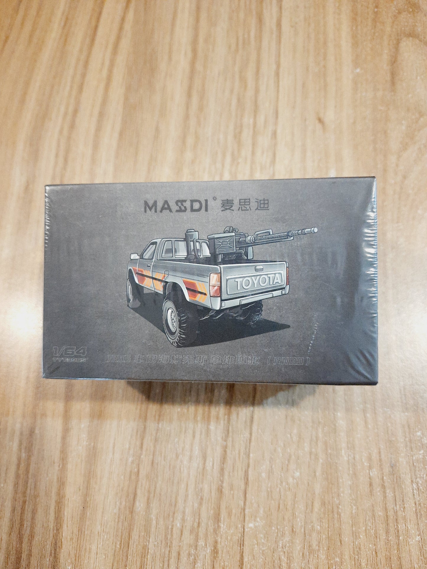 Massdi Toyota Hilux 1:64 diecast scale model TYT3905 pickup truck with realistic detailing and rubber tyres