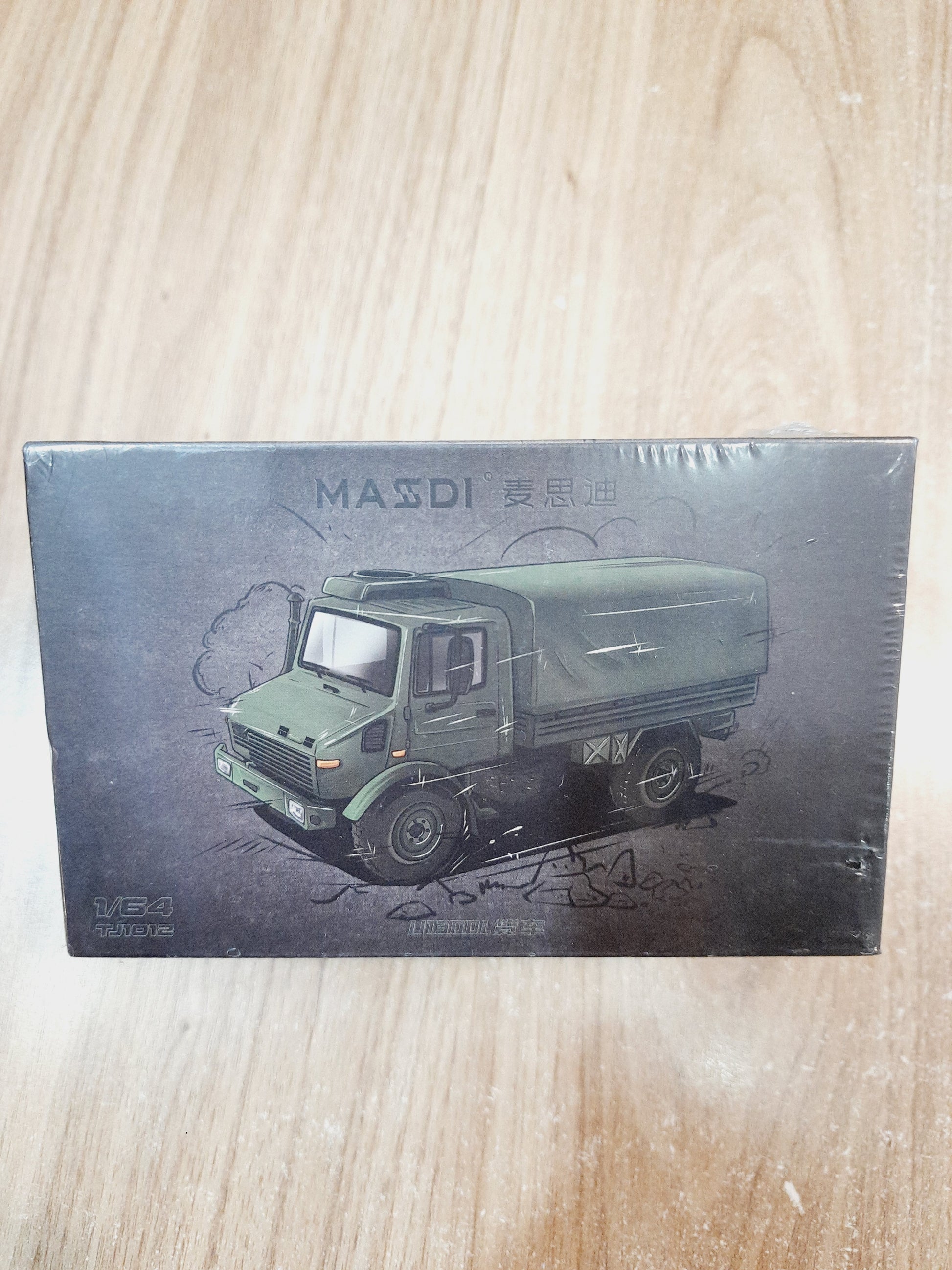 Massdi Unimog U1300L 1:64 diecast truck TJ1012 military green detailed model with rubber tyres